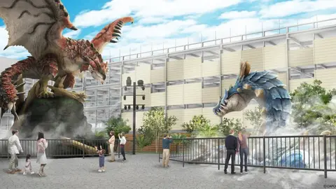 Render oficial das estátuas de Rathalos (vermelho) e Lagiacrus (azul) em praça de Fukuoka, com visitantes