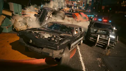 Imagem oficial de Cyberpunk 2077 mostrando uma rua de Night City com iluminação de neon