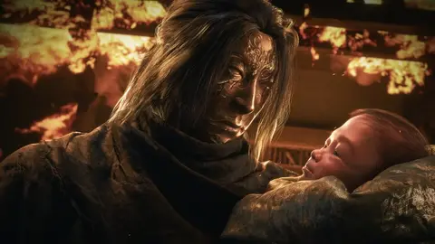 Cena em CGI de personagem de rosto pintado e manto segurando um bebê, com chamas ao fundo
