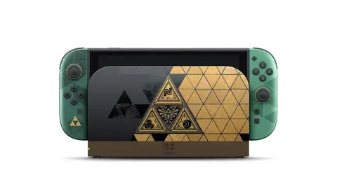 Console Nintendo Switch 2 edição 40 anos de The Legend of Zelda, com Joy-Cons verdes e dock dourado com triforce, em fundo branco
