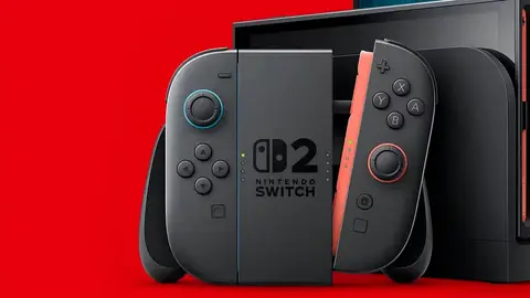 Joy-Con e dock do Nintendo Switch 2 em frente a um fundo vermelho, imagem oficial de produto